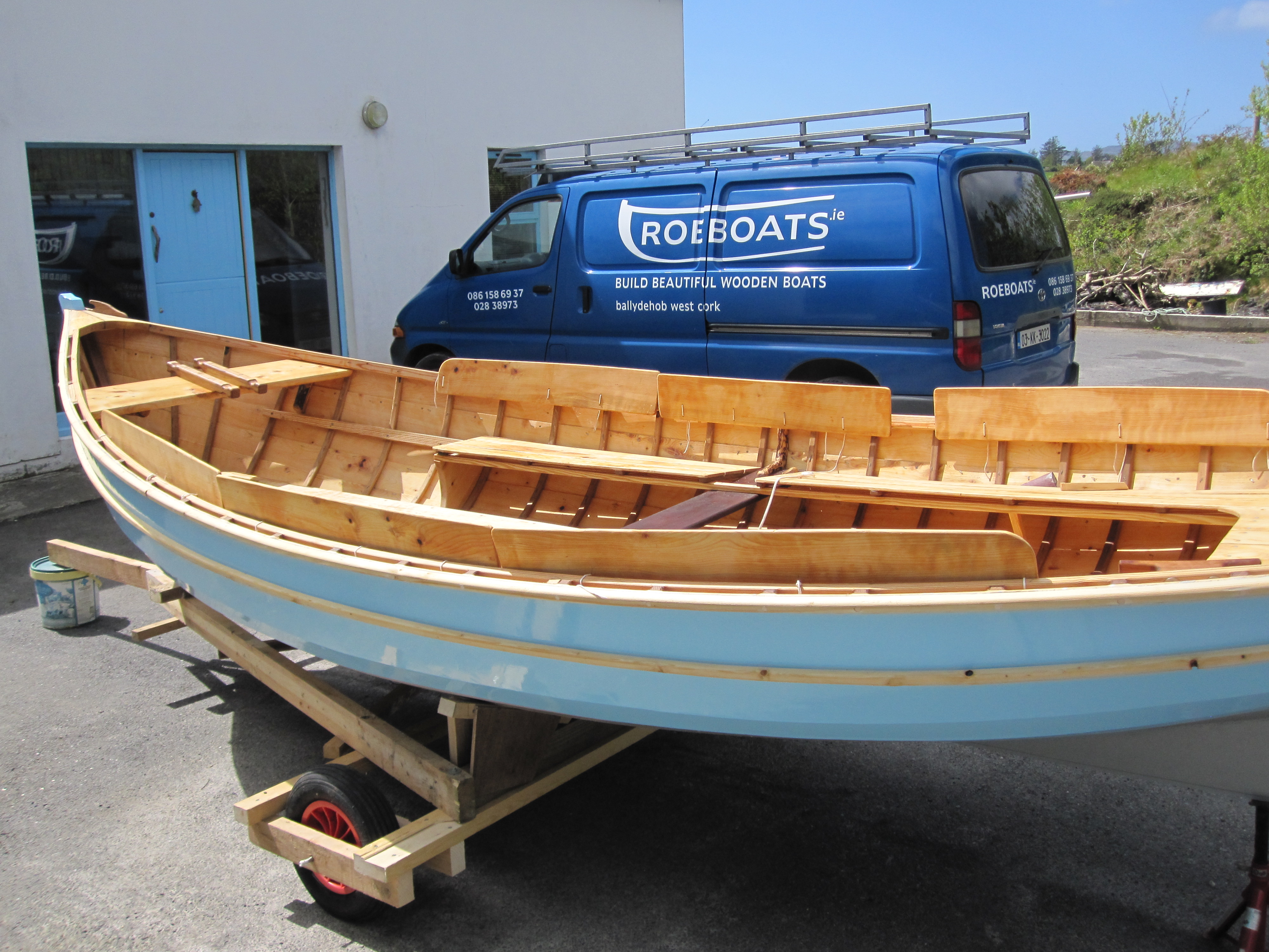 16′ sea boat is out of the workshop. wooden boat builder